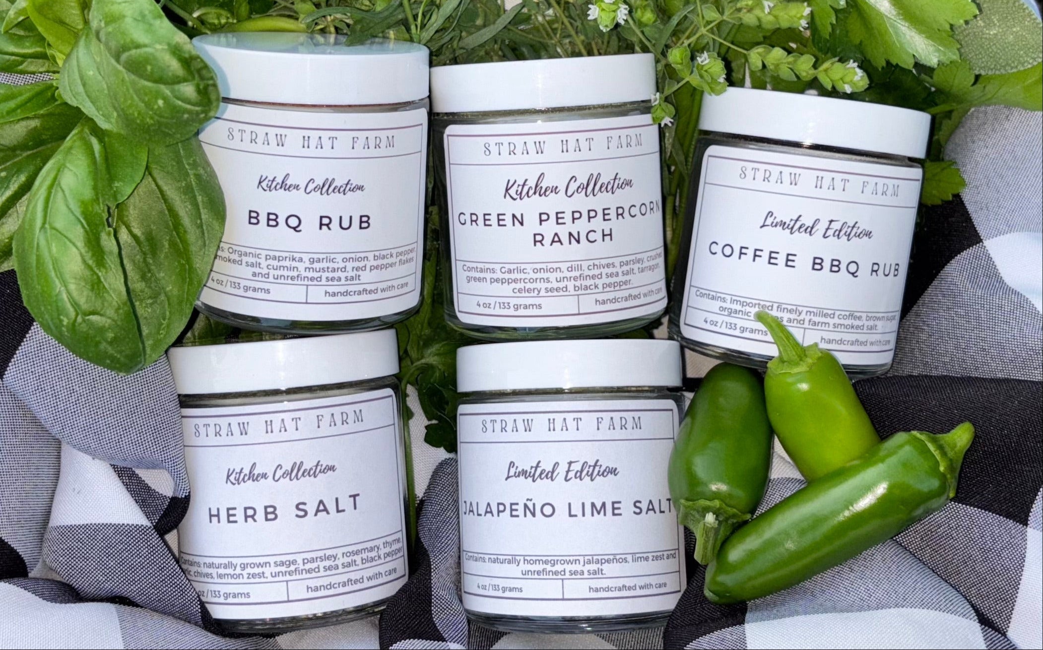 a basket of five seasoning blends surrounded by fresh herbs
